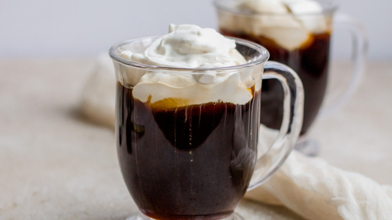 coffee topped with whipped cream