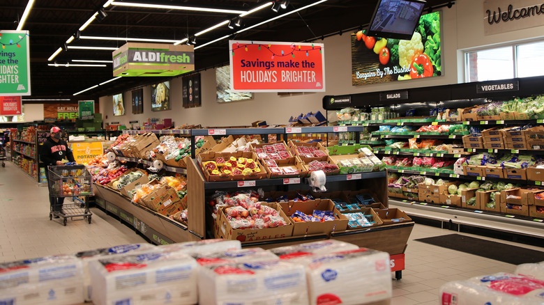 Customer shopping in Aldi produce section