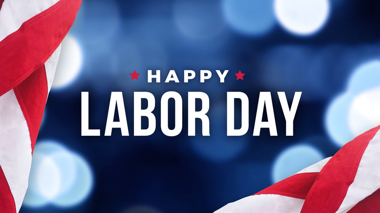 Happy Labor Day graphic with American flags