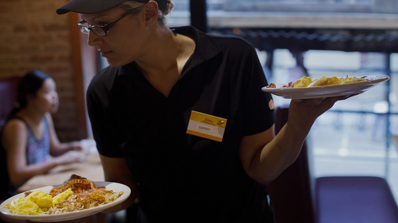 A Denny's waitress at work