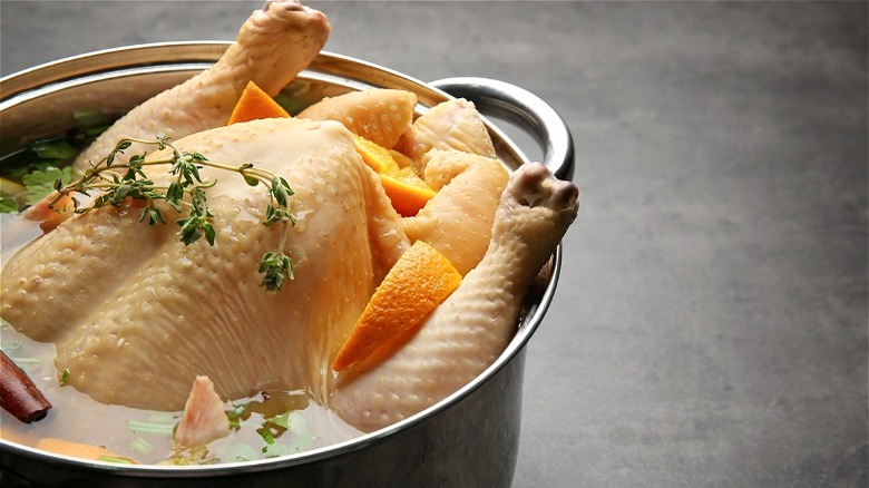 Turkey in pot brine with citrus and herbs