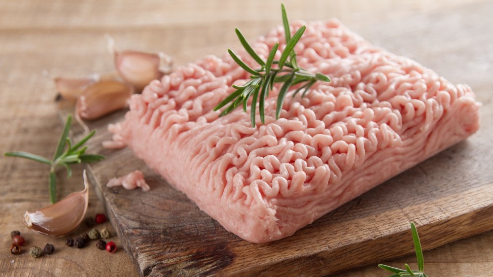 Ground turkey on a cutting board