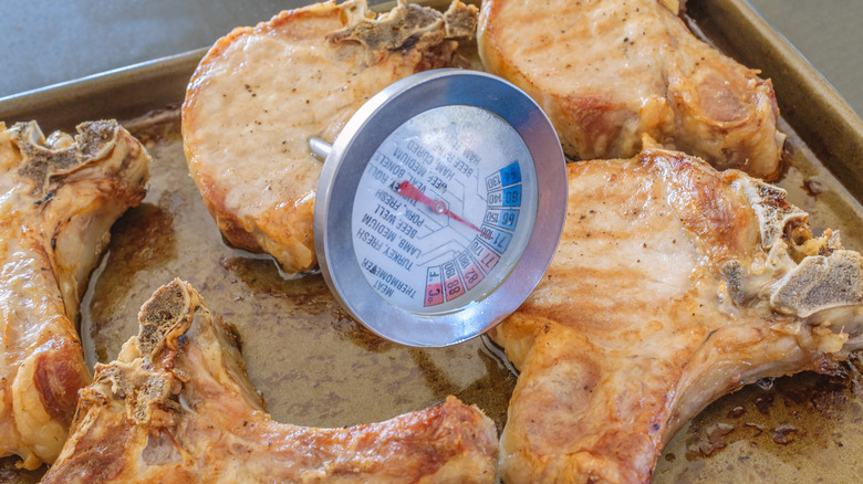 meat thermometer in pork chops