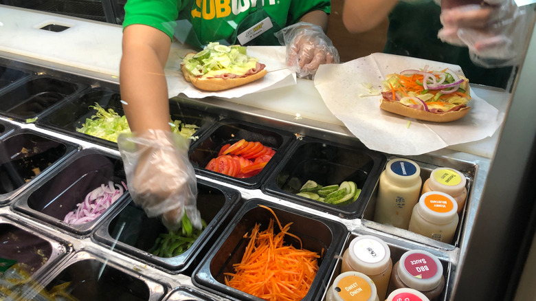 Subway workers making sandwiches