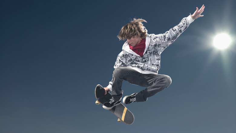 skateboarder performing high-flying stunt