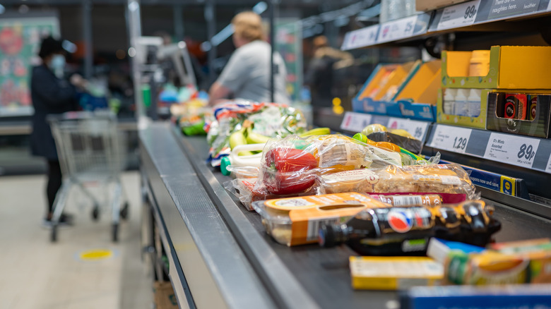 Conveyor belt of grocery items