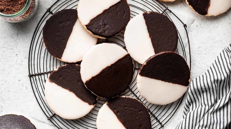 black and white cookies on rack