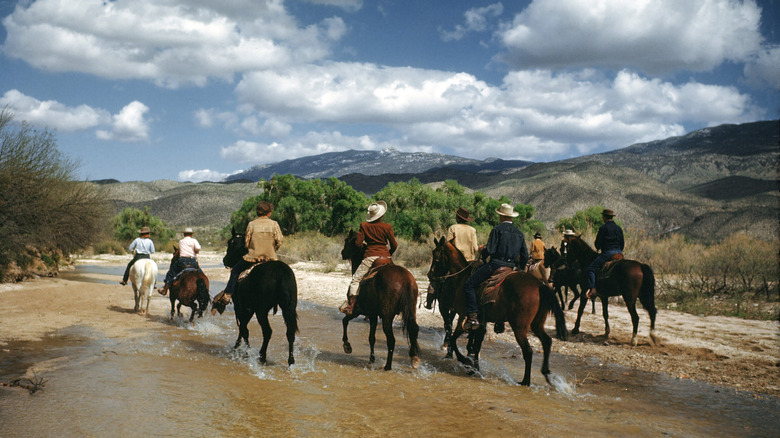 People on horseback at a dude ranch