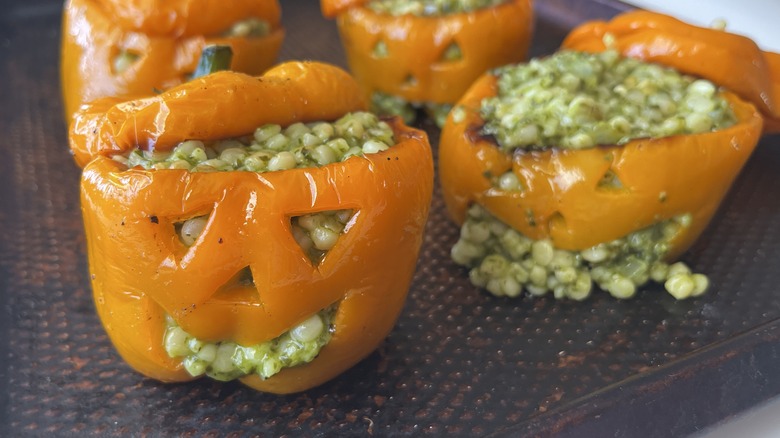 couscous-stuffed jack-o-lantern peppers