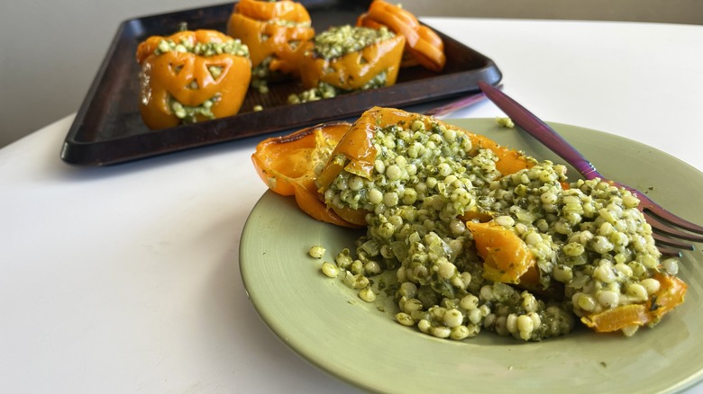 couscous-stuffed jack-o-lantern peppers