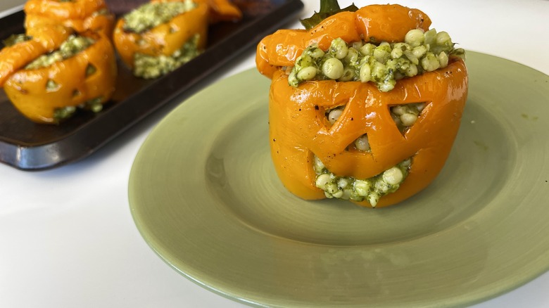 couscous-stuffed jack-o-lantern peppers