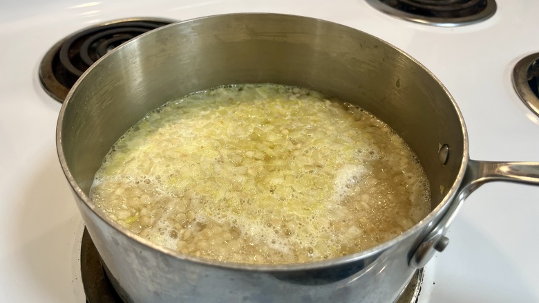 couscous simmering in broth