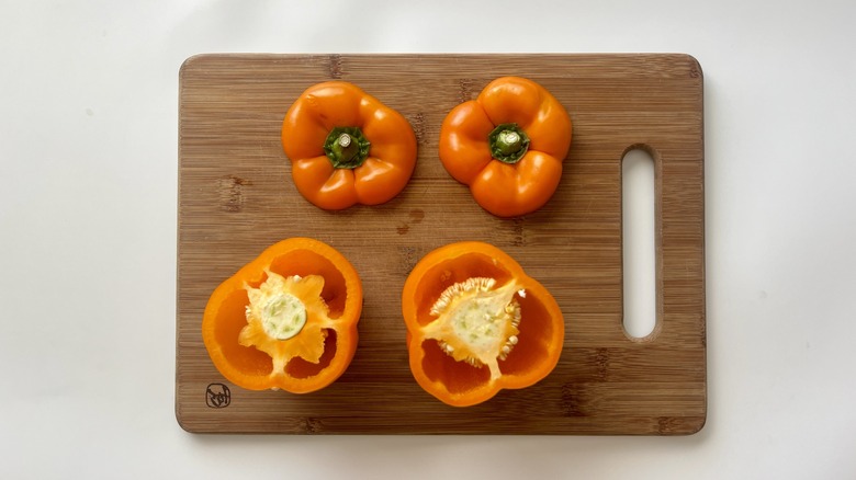 two peppers with top cut off