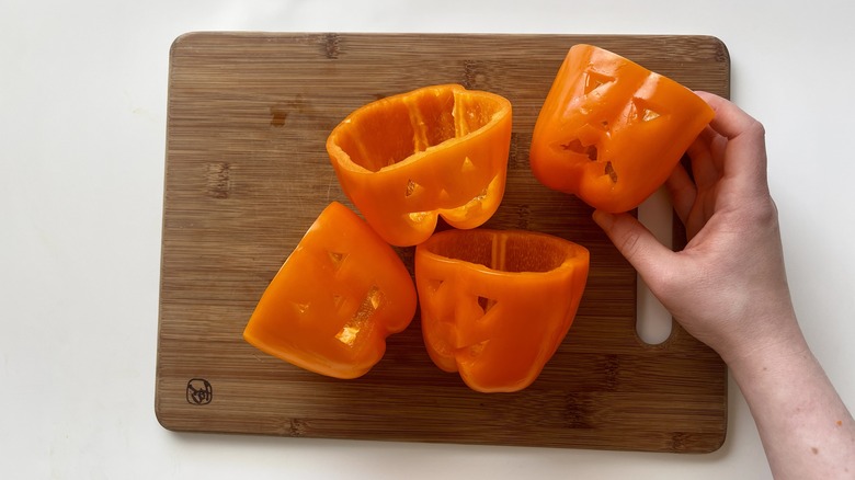 peppers with cut out jack-o-lanterns