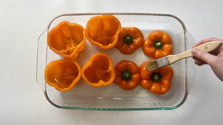 brushing peppers with oil