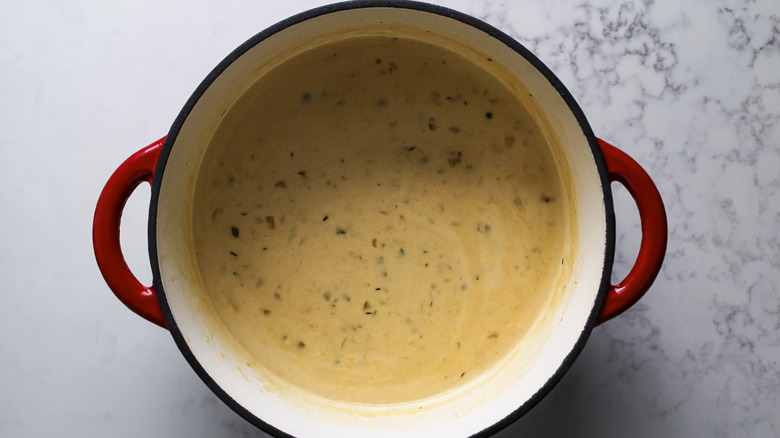 cream and broth in beer cheese soup