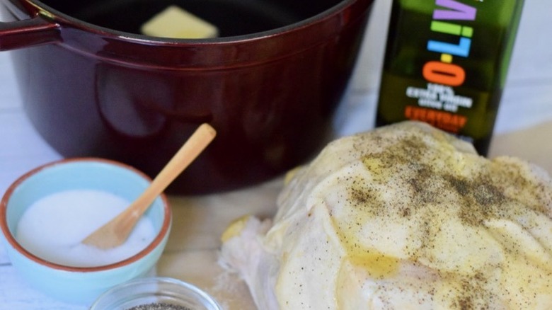 chicken fitted into a pot