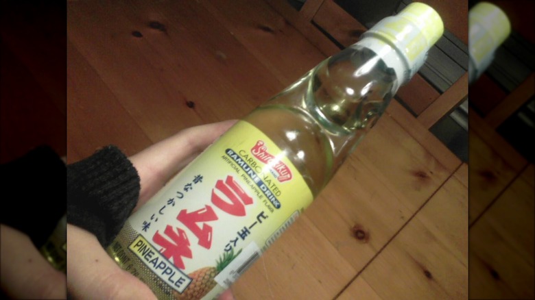 Person holding Pineapple Ramune 