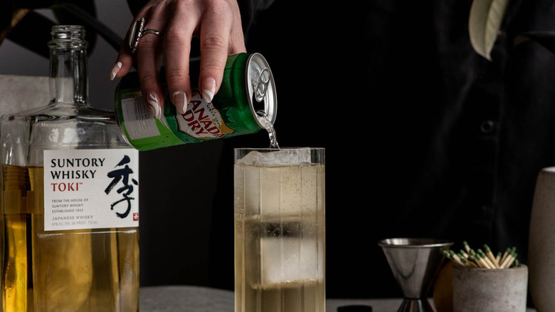 ginger ale pouring into glass