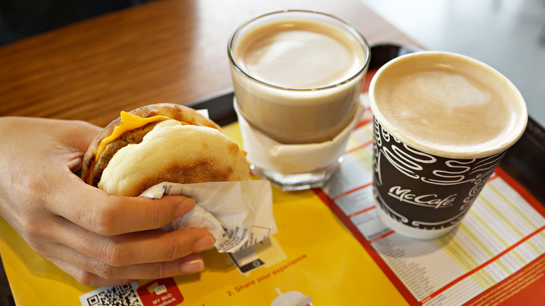 McDonald's breakfast sandwich with coffees