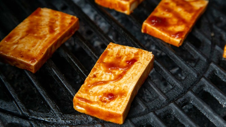 BBQ sauce tofu slices on grill