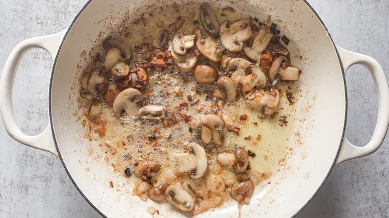 mushrooms sauteeing in butter