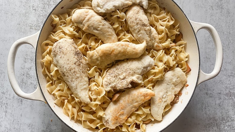 dutch oven with egg noodles and chicken