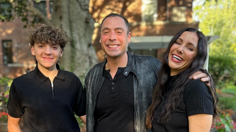 Jeff Mauro smiling with his family