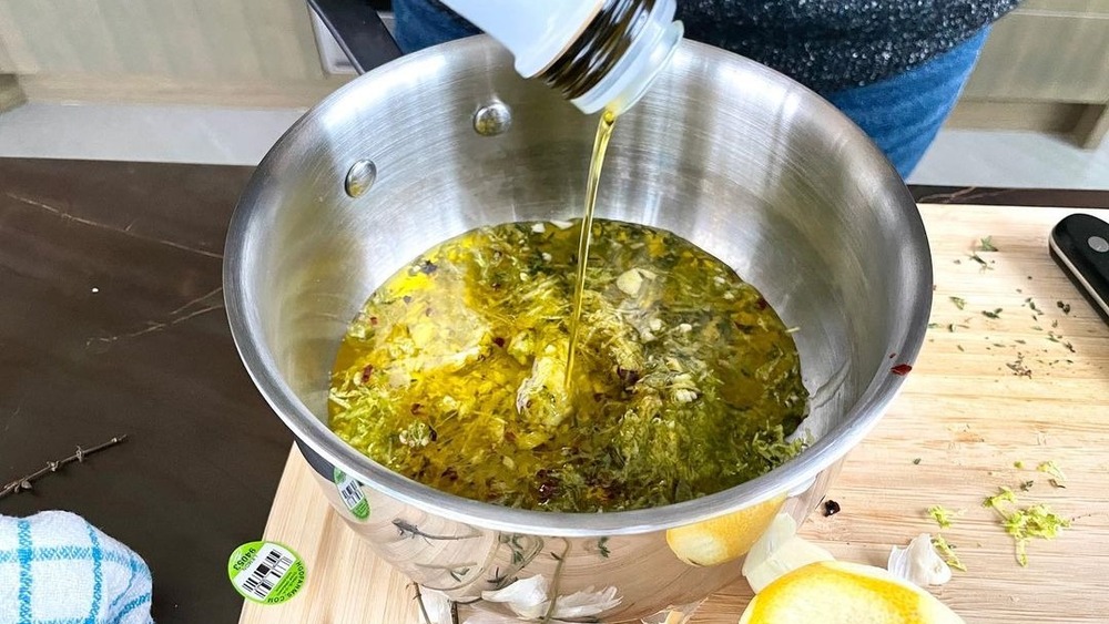 Herbs and oil in a bowl