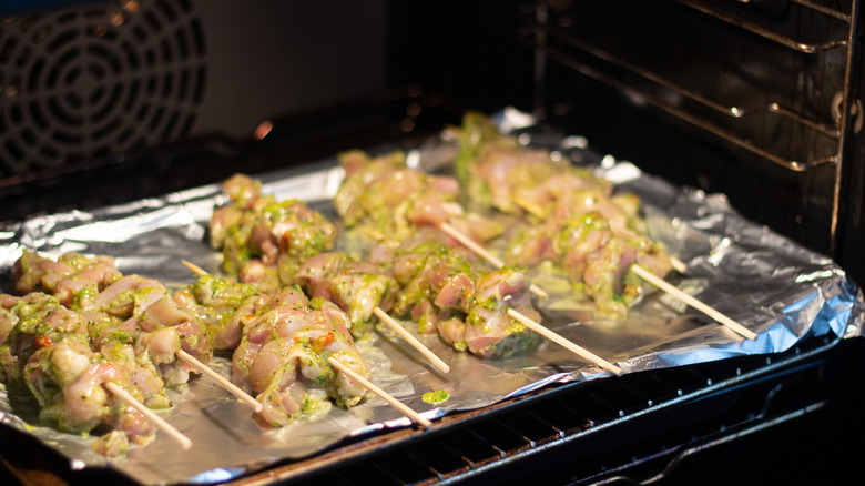 Chicken on skewers in oven