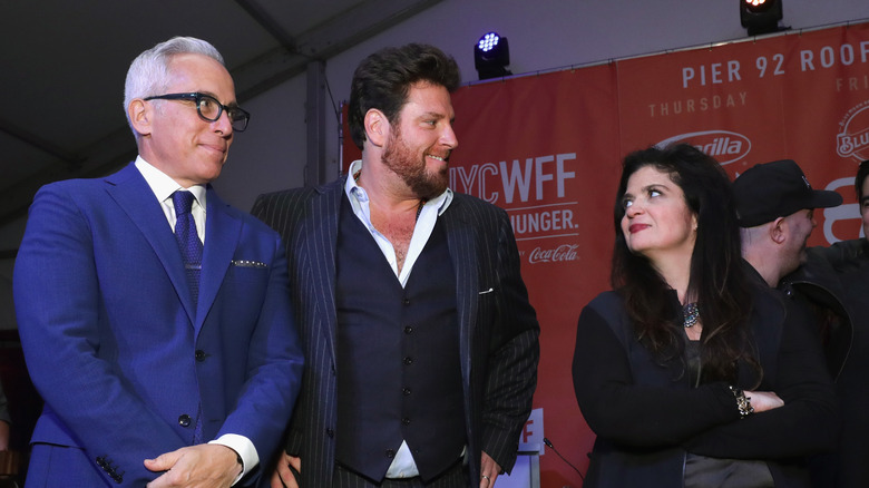 Chopped judges Alex Guarnaschelli, Geoffrey Zakarina, and Scott Conant