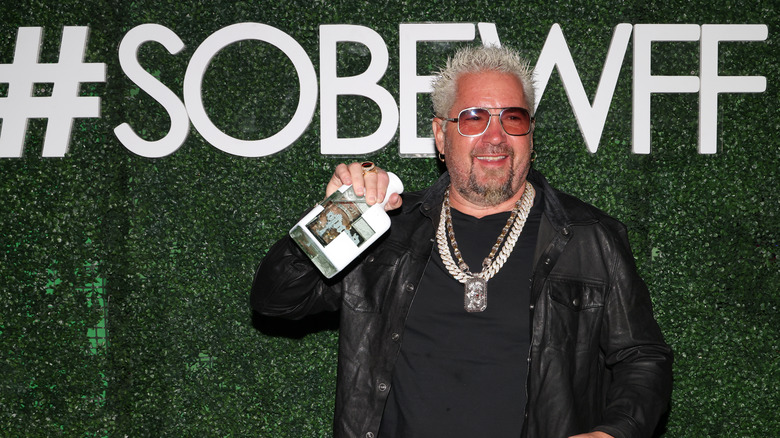 Guy Fieri posing at South Beach Wine and Food Festival