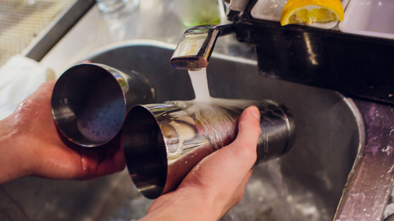 Bar sink with glasses