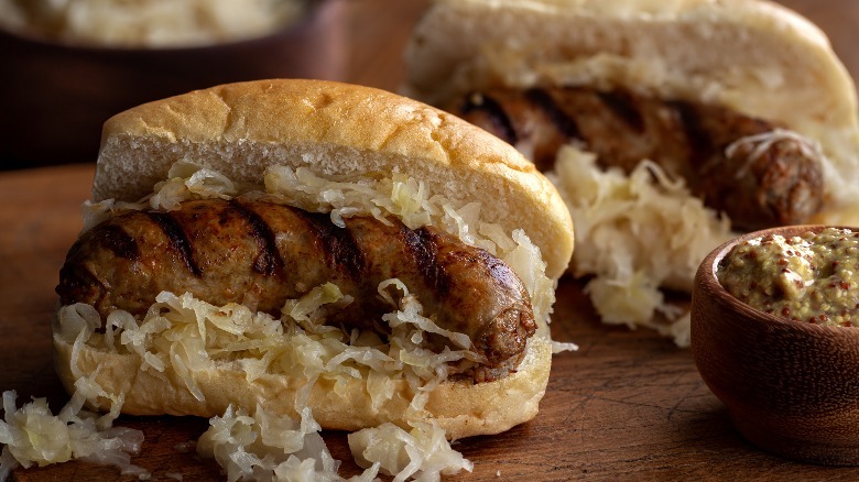 Bratwurst with sauerkraut in bun