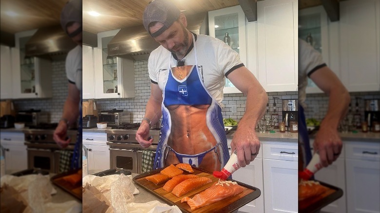 Joel McHale preps salmon