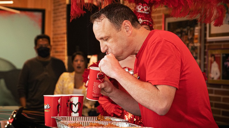 Joey Chestnut eating Raising Cane's