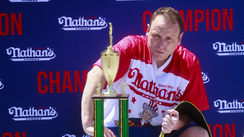 Joey Chestnut with trophy