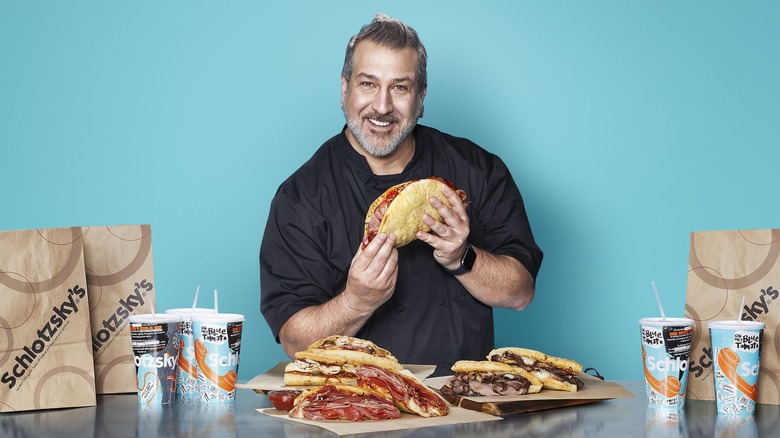 Joey Fatone with Schlotzsky's calzones