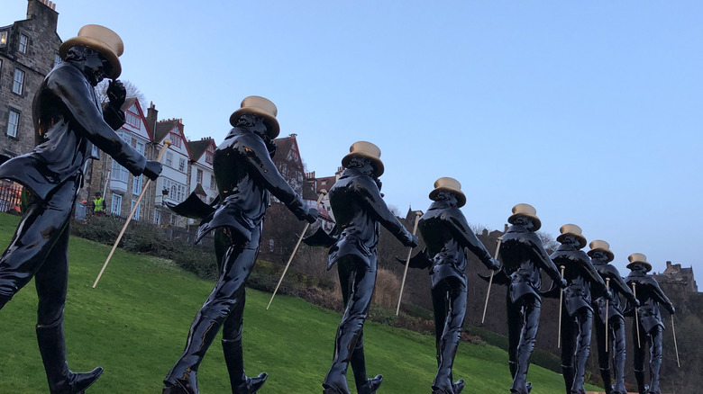 Row of Johnnie Walker statues