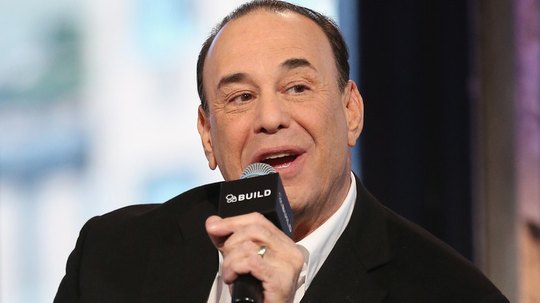 Taffer speaking into microphone 