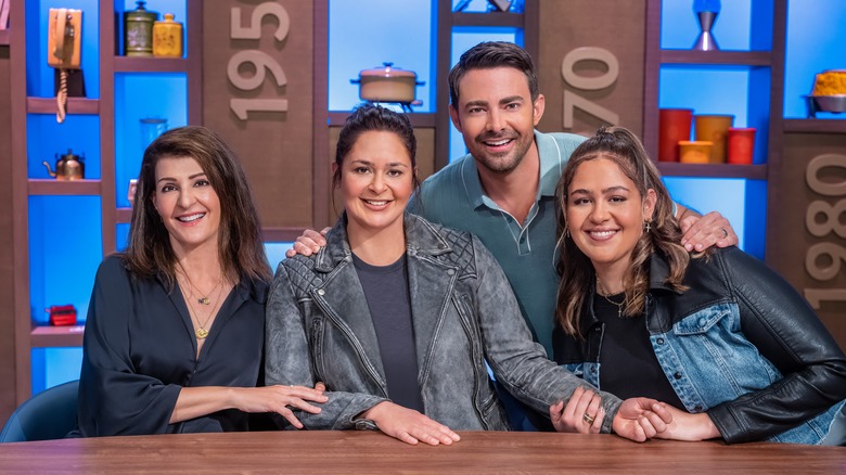 Jonathan Bennett smiling with guest judges