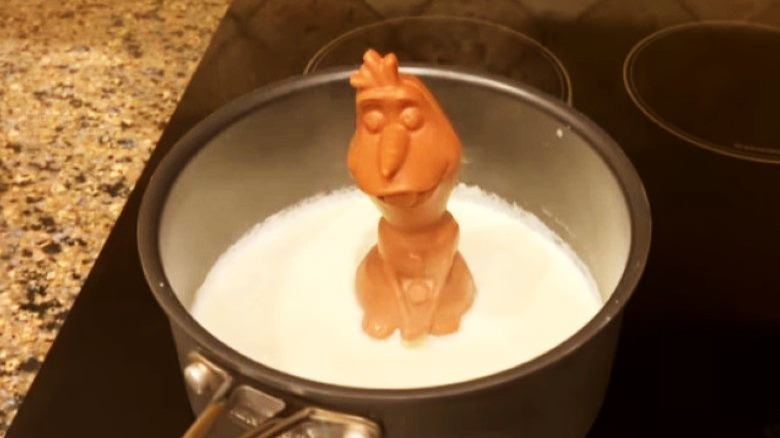 Chocolate Olaf in a pot of boiling milk