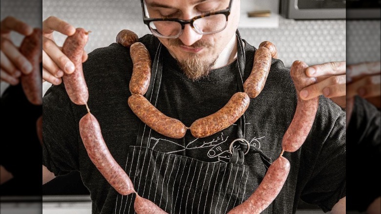 Joshua Weissman with sausages 