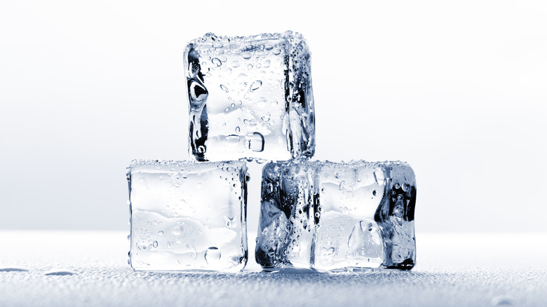 three ice cubes stacked
