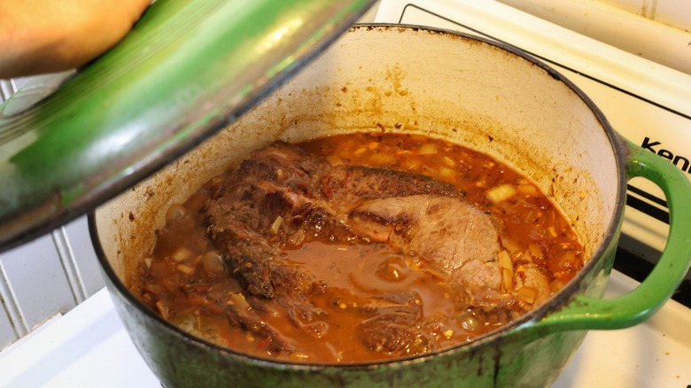 simmering pot of barbacoa