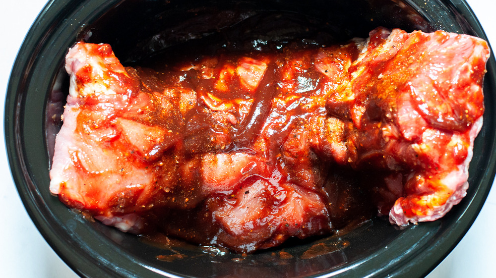 ribs covered in BBQ sauce