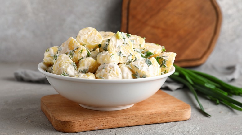 Potato salad in white bowl