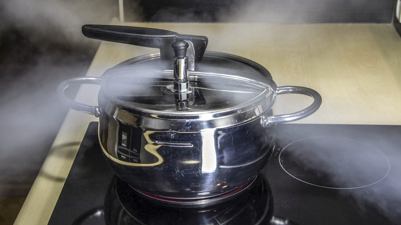 steam coming out of a pressure cooker