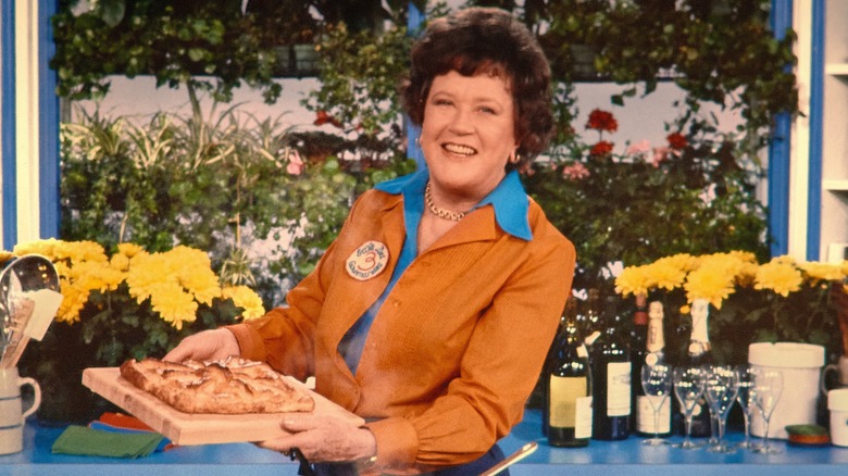 Julia Child holding a tart
