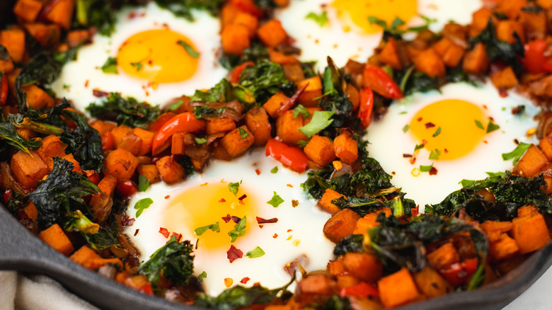 Close up of kale and sweet potato hash in skillet